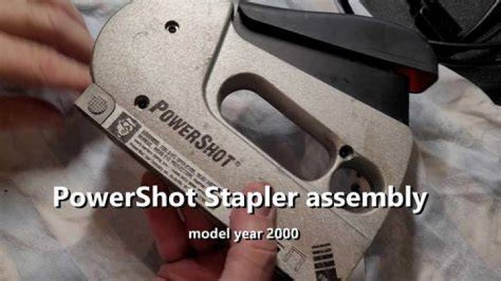 How do you load staples into a PowerShot stapler?