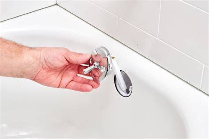 How do you remove the overflow from a bathtub?