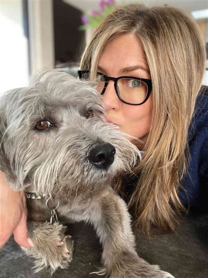 Jennifer Aniston with her dog Dolly as a puppy