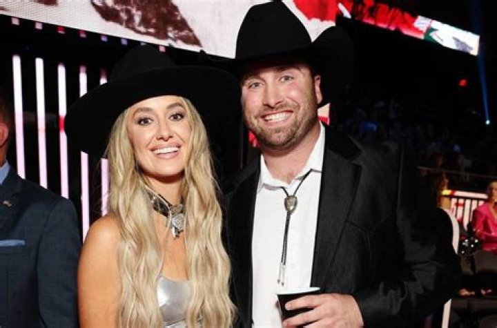 Lainey Wilson and Devlin Hodges have been going strong for over two years.